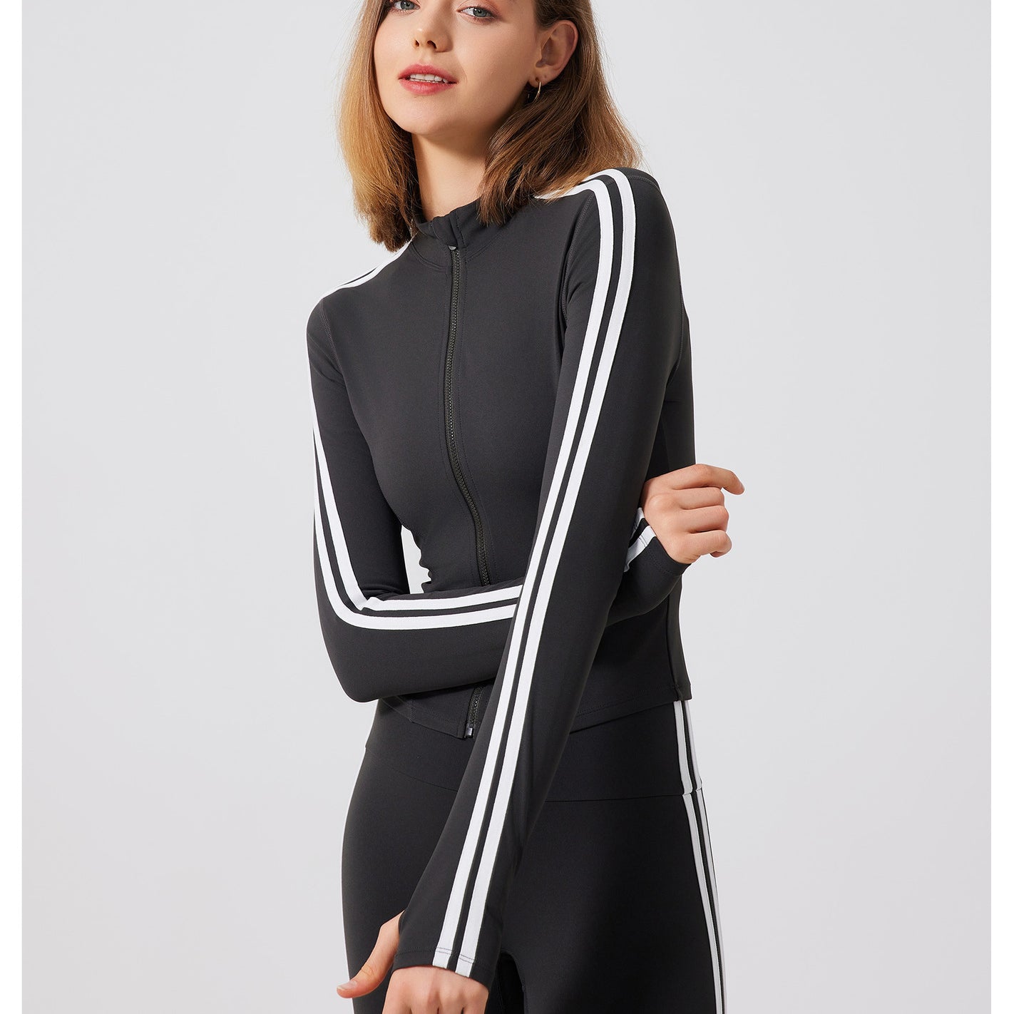 Black adidas track jacket with white stripes, running skin friendly fitness top