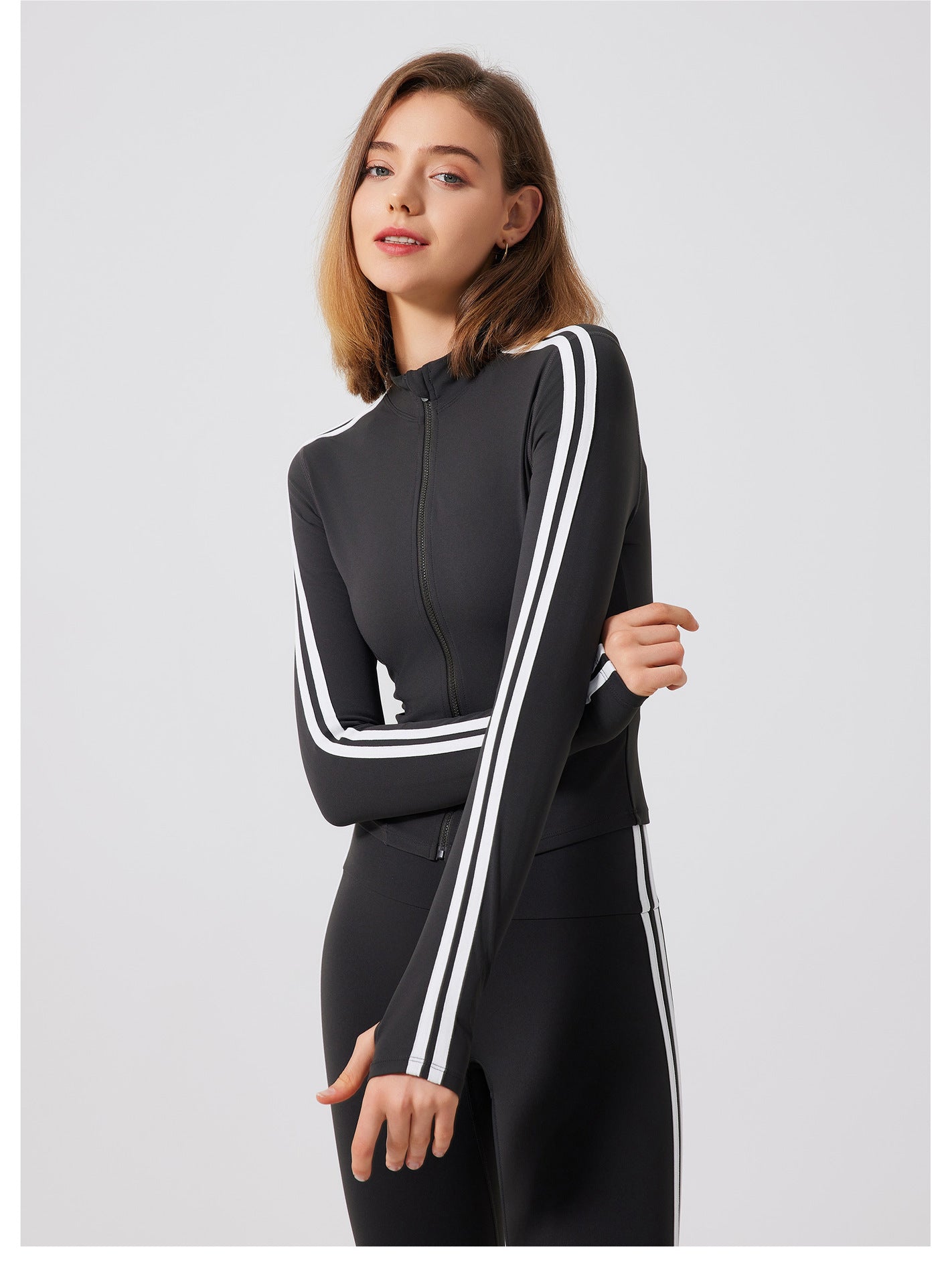 Black adidas track jacket with white stripes, running skin friendly fitness top