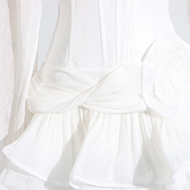 Elegant white ruffled blouse with bell sleeves in Langry fashion