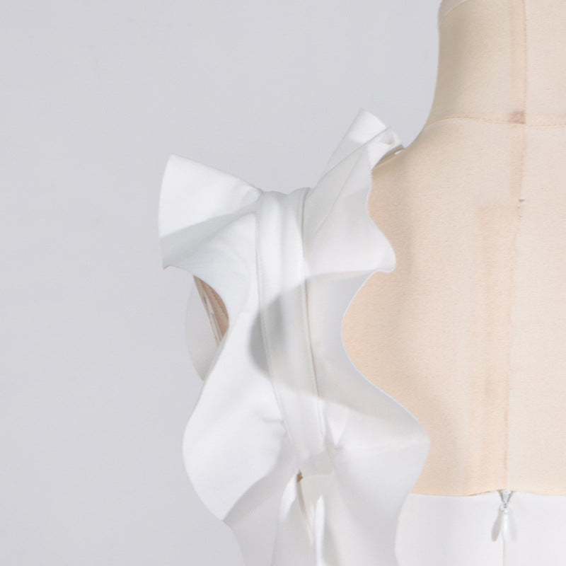 White ruffled dress on mannequin showcasing High Grade Stitching Floral Summer fashion ملابس