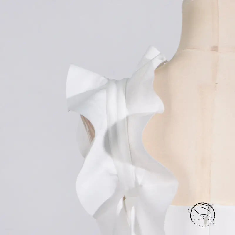 White ruffled floral summer slim fit dress with high grade stitching on mannequin