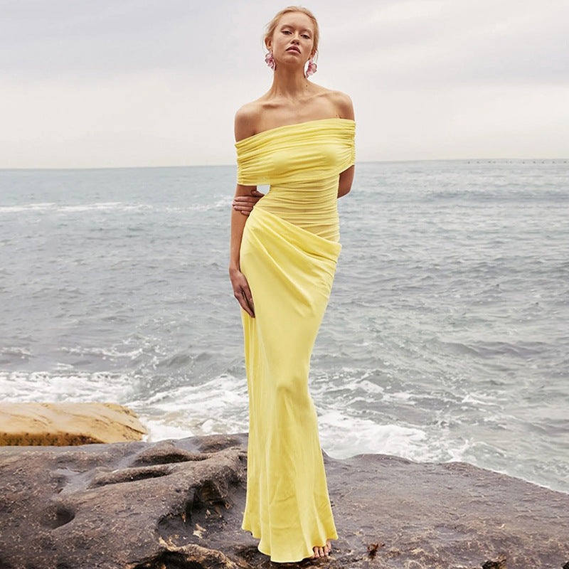 Yellow off-shoulder draped evening gown, a stunning maxi dress showcasing elegant fashion