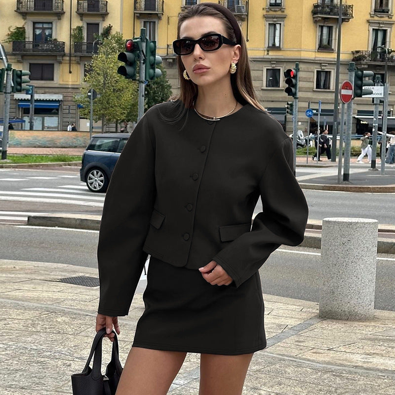 Modern Cardigan Top Slim Fit Skirt Set featuring a woman’s dark green skirt suit in fashion