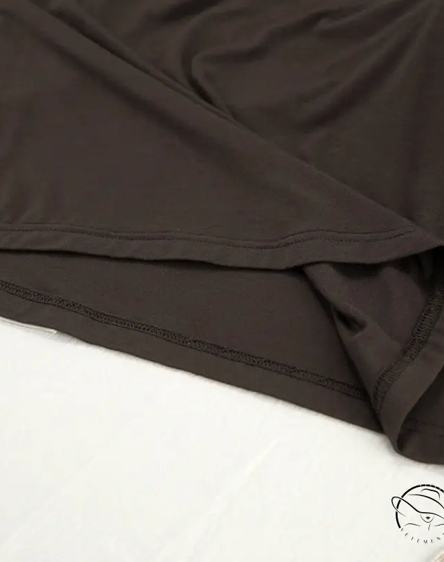 Dark brown knitted round neck pajama suit with visible stitching