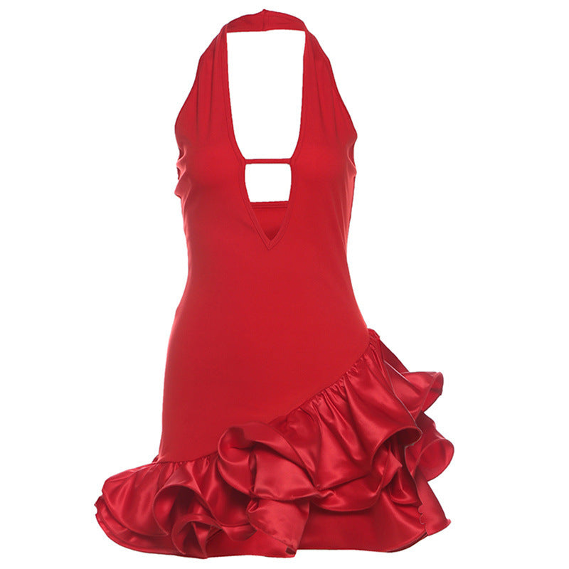 Red halter dress with ruffled asymmetrical hem, perfect for elegant fashion statements