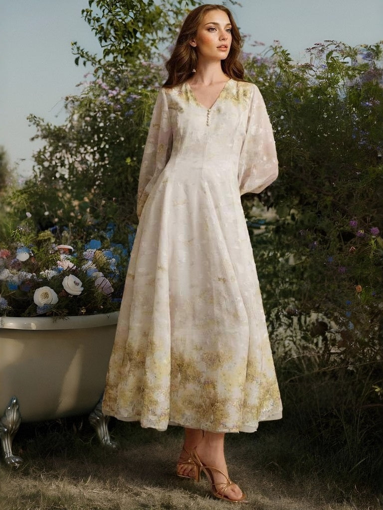 Enchanting Heavy Industry maxi dress in cream lace with floral embroidery and long sleeves