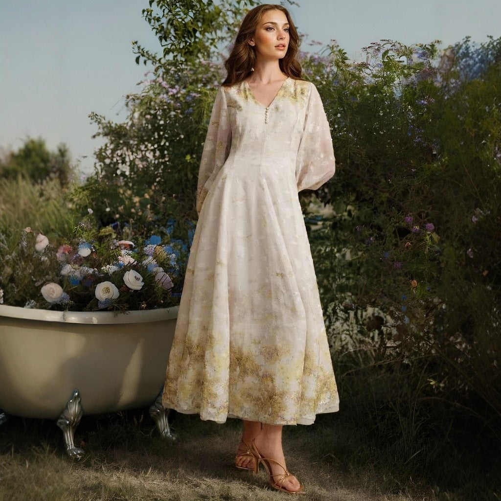 Enchanting Heavy Industry maxi dress in cream lace with floral embroidery and long sleeves