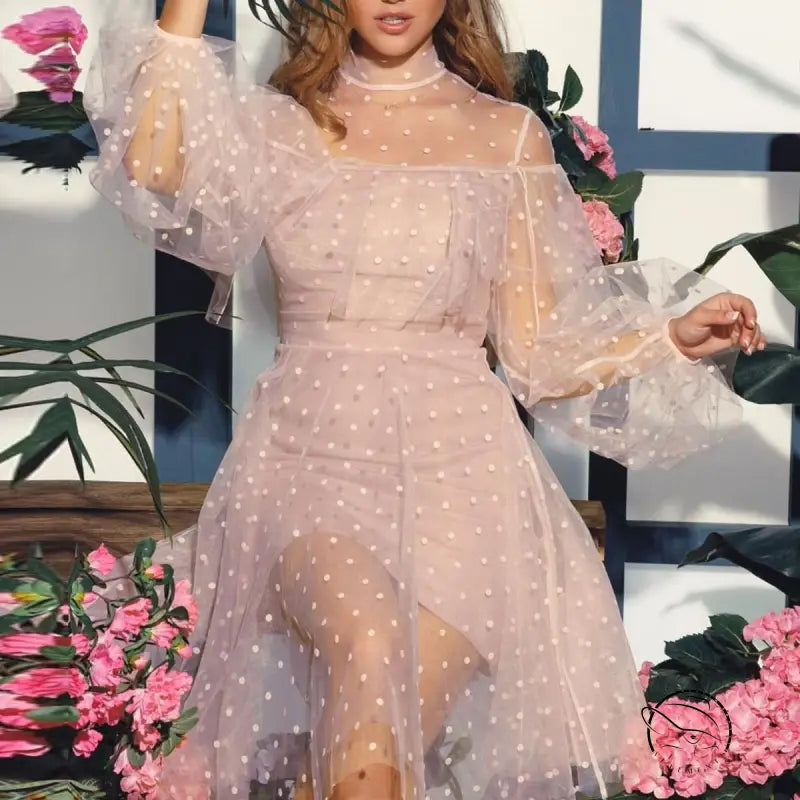 Elegant evening dress: sheer polka dot in light beige with puffy sleeves