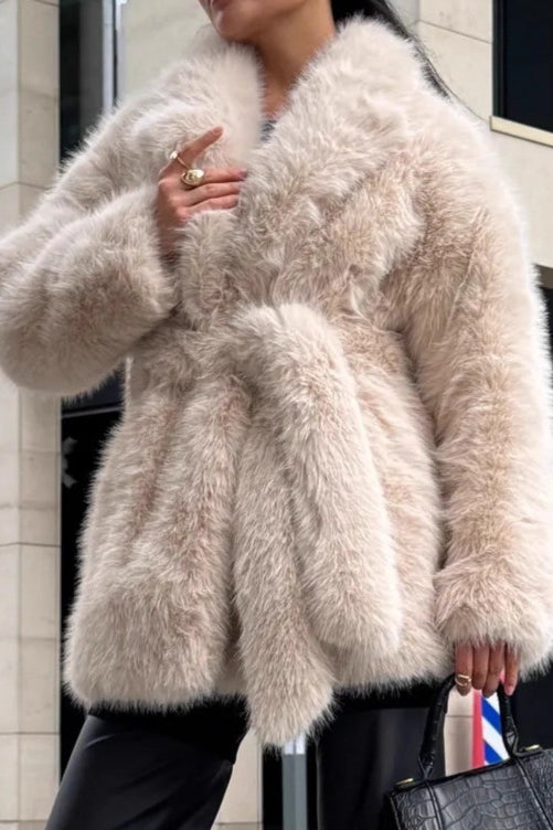 Beige faux fur coat with high collar, buttons, and belt