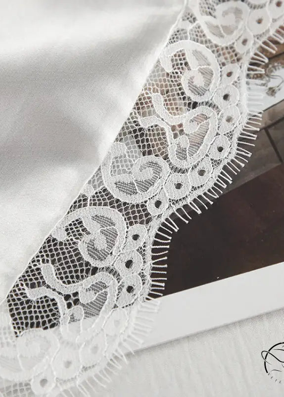 White lace trim on langry ice silk pajamas with floral patterns