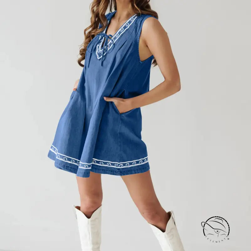 Beautiful embroidered vest denim dress in blue with white trim