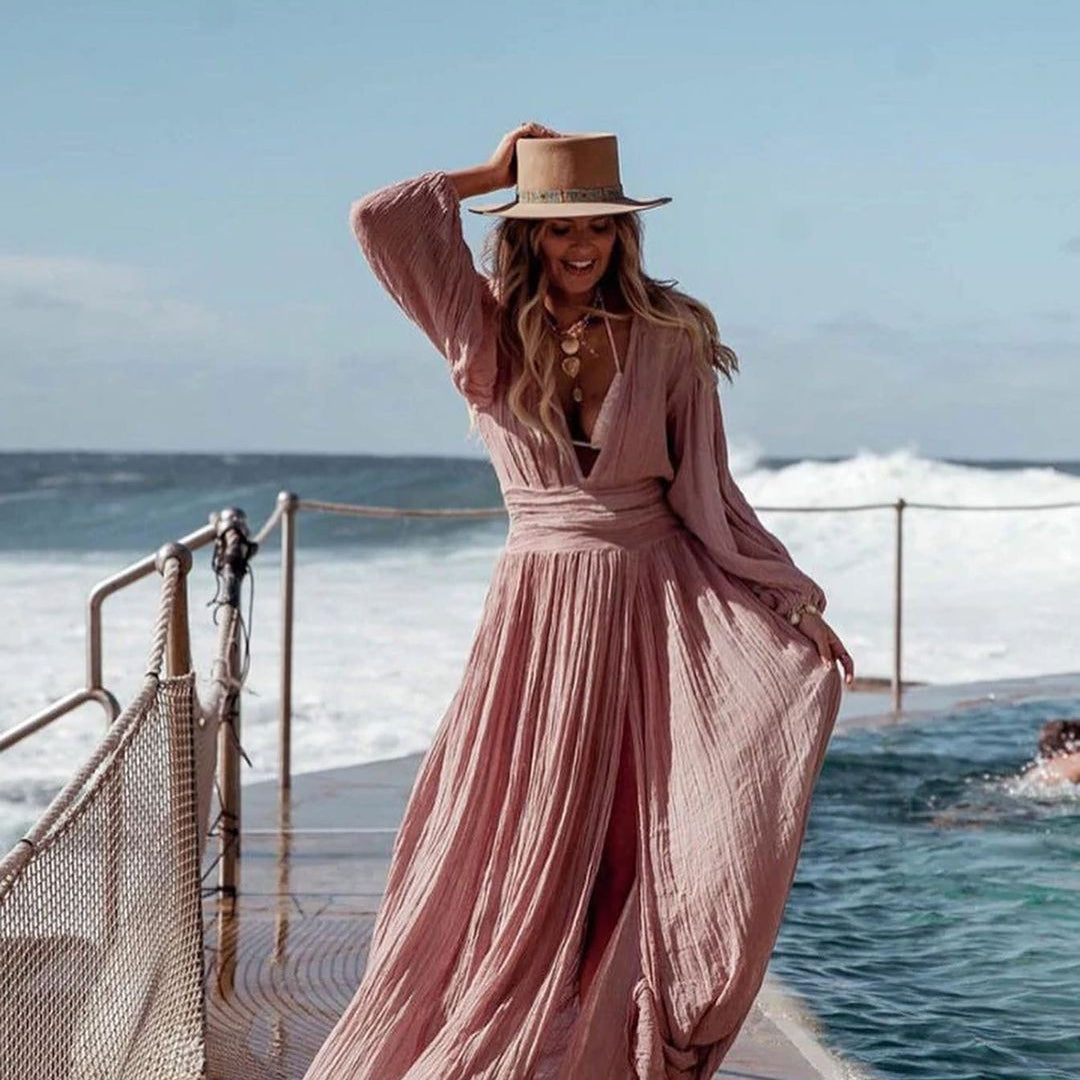 Elegant vacation dress featuring flowing pink lantern sleeve cotton line dress with hat