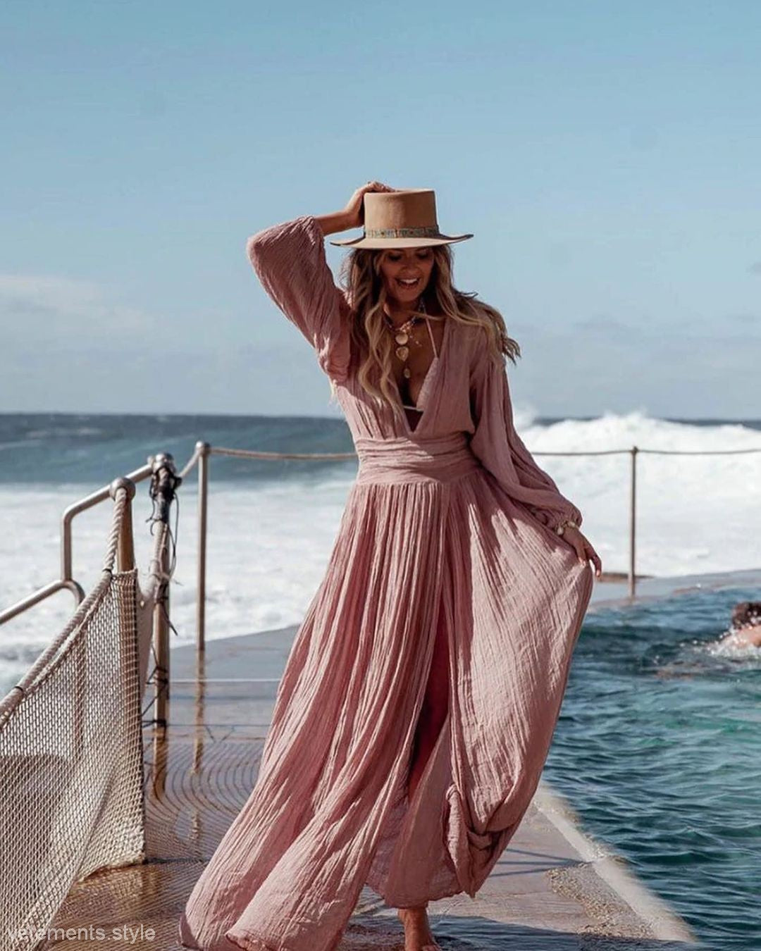 Elegant vacation dress featuring flowing pink lantern sleeve cotton line dress with hat