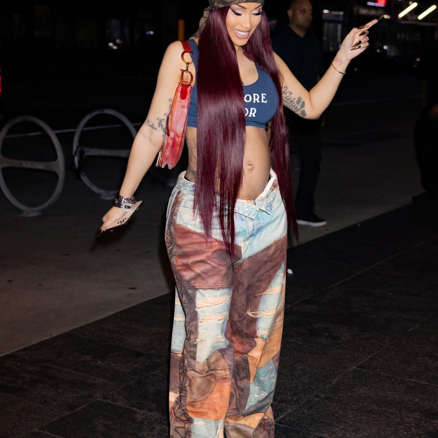 Model showcasing Casual Dirty Denim Pants with patchwork wide-leg design and crop top