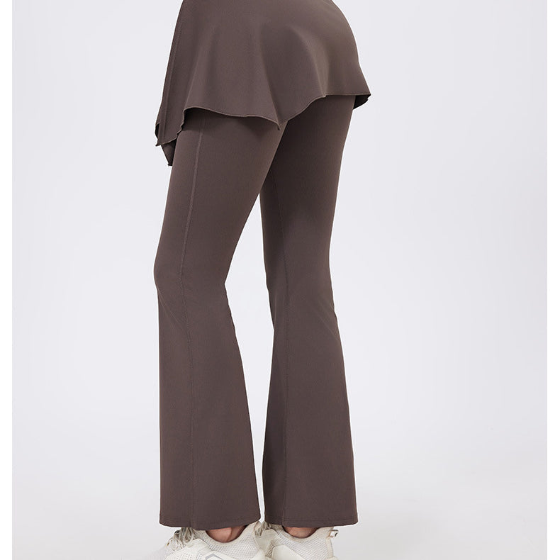 Brown flared hip lifting nude feel yoga pants with layered hem and white sneakers