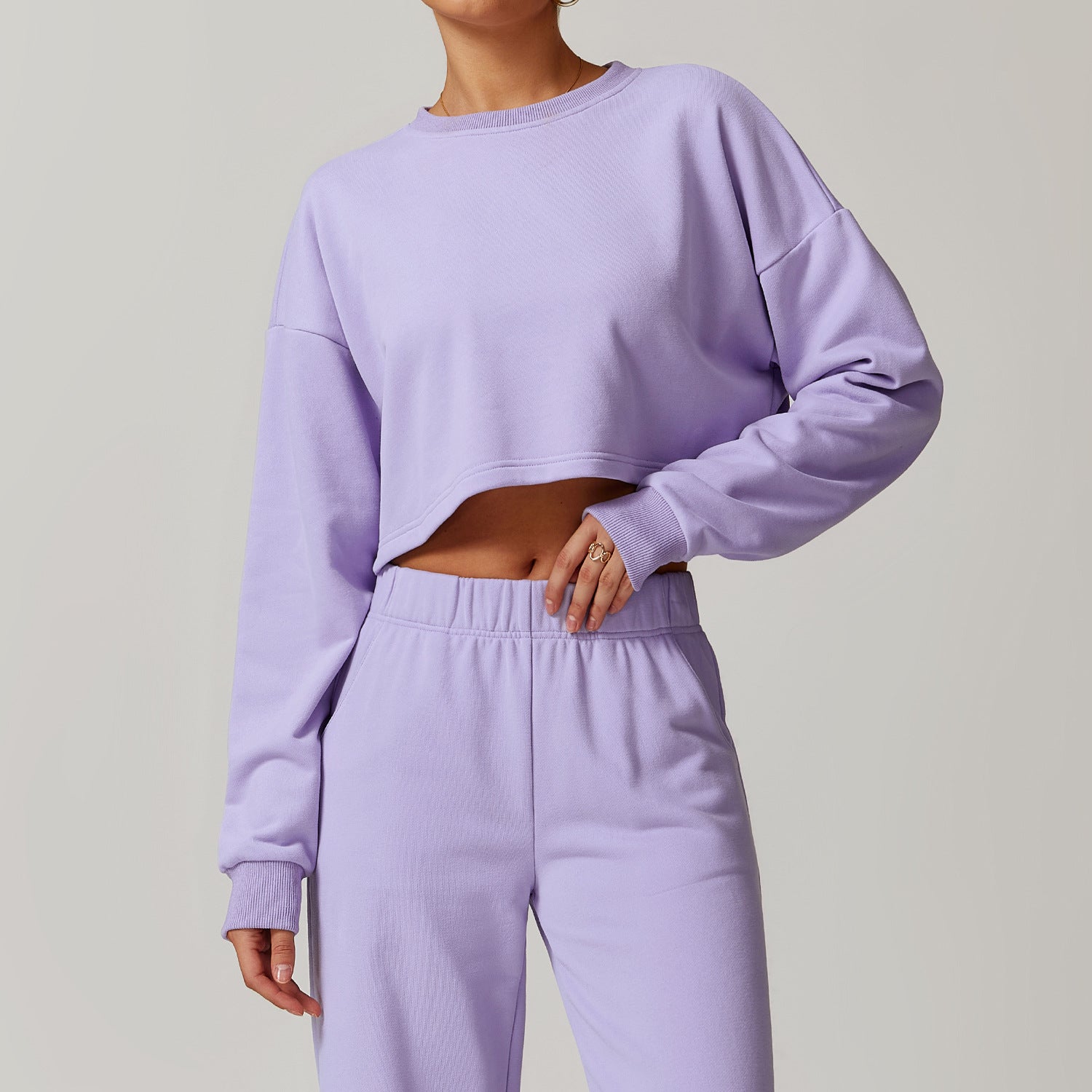 Lavender cropped sweatshirt and sweatpants set for stylish long sleeve workout fashion