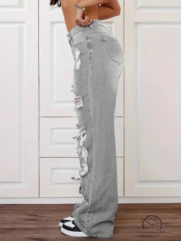 Light gray distressed langry fashion jeans with rips, frayed high-waist design