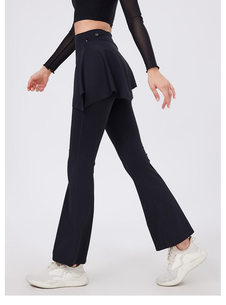 Black hip lifting yoga pants with nude feel peplum waistband and white sneakers