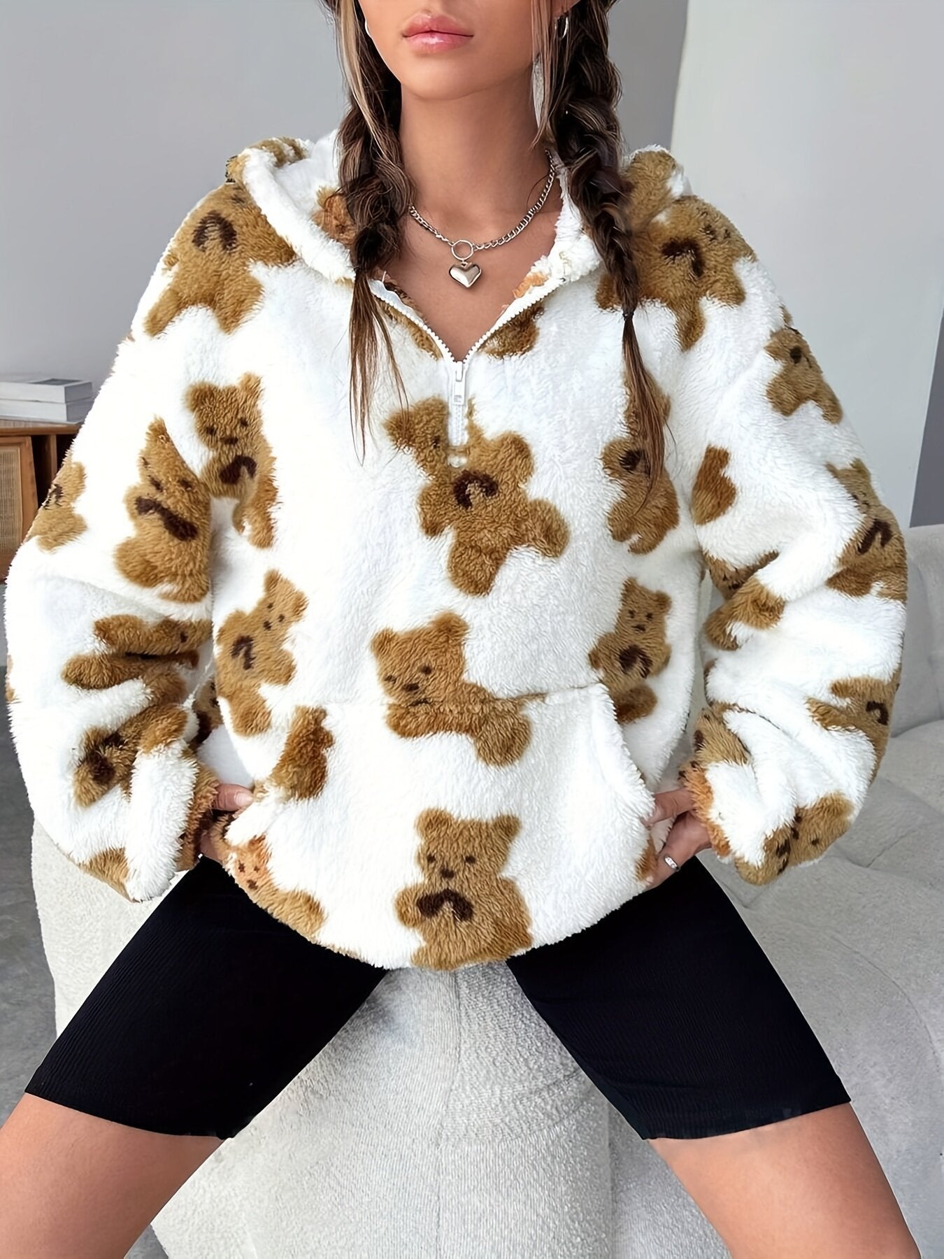 Fluffy white pullover sweater with brown teddy bear print, perfect for Langry fashion ملابس