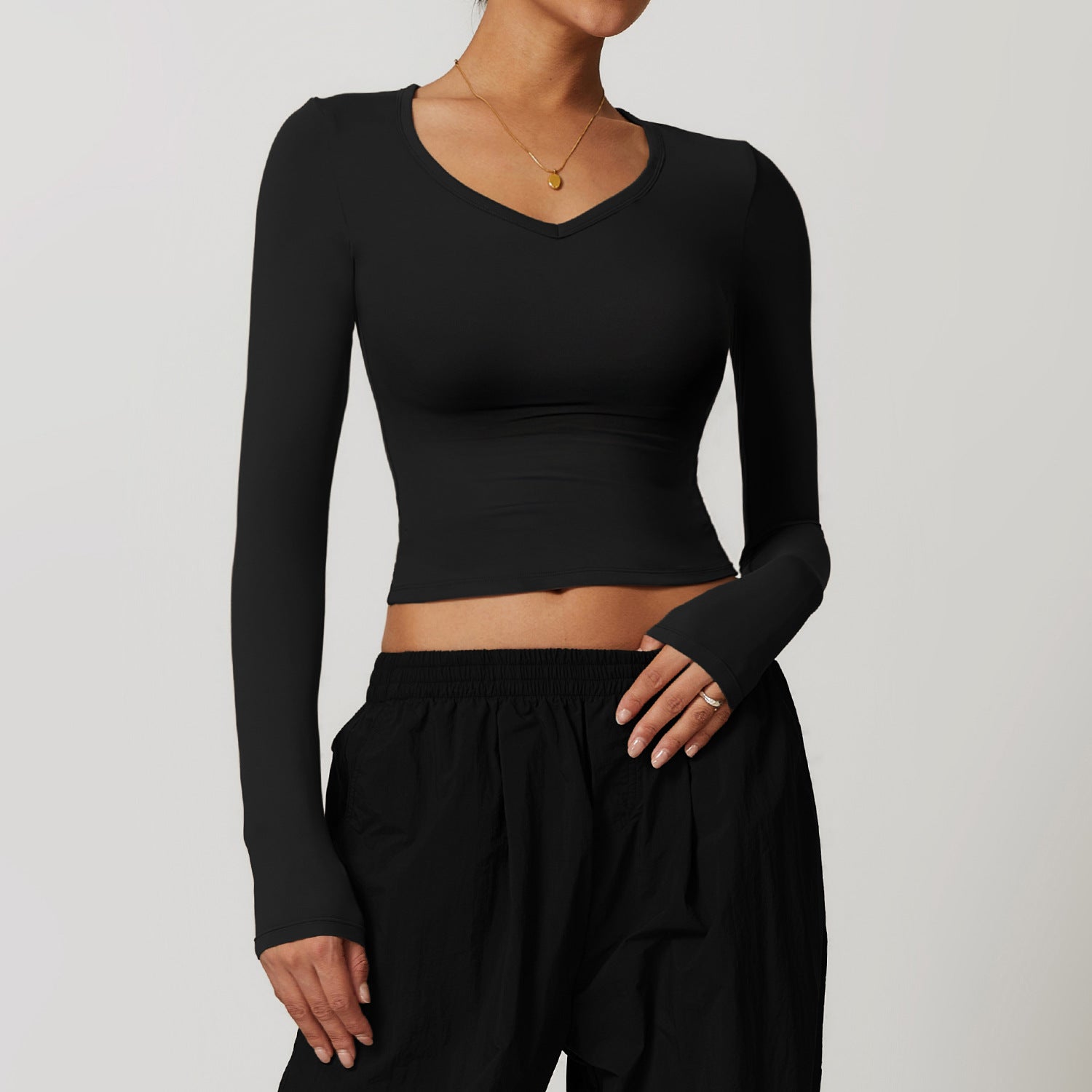 Black long-sleeved crop top from Winter Quick Drying Brushed Tight Yoga T Shirt collection, stylish ملابس for winter fashion