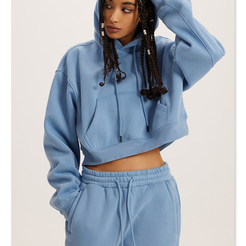 Light blue cropped hoodie and sweatpants loungewear set for cozy winter fashion