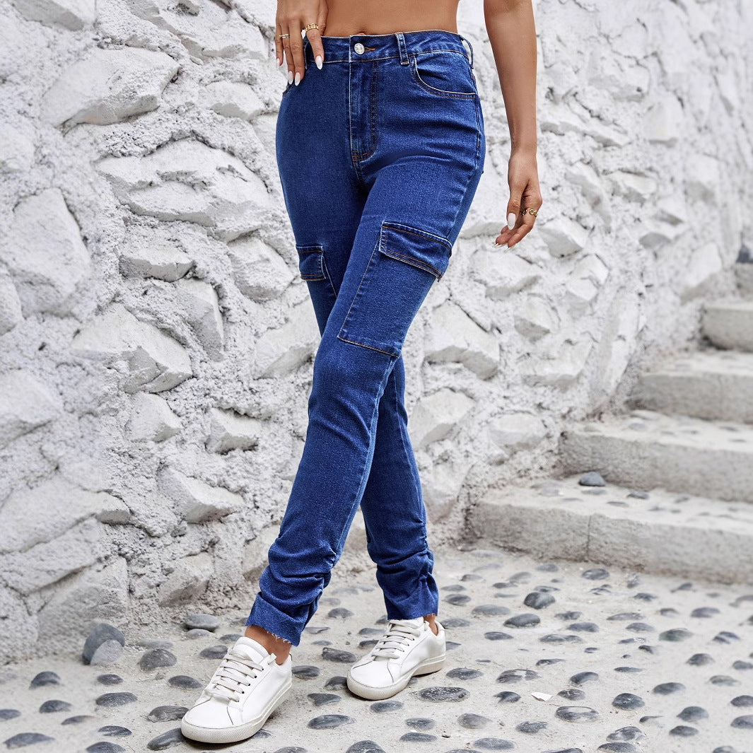 Blue denim cargo pants with pockets and white sneakers, stylish ملابس for fashion enthusiasts