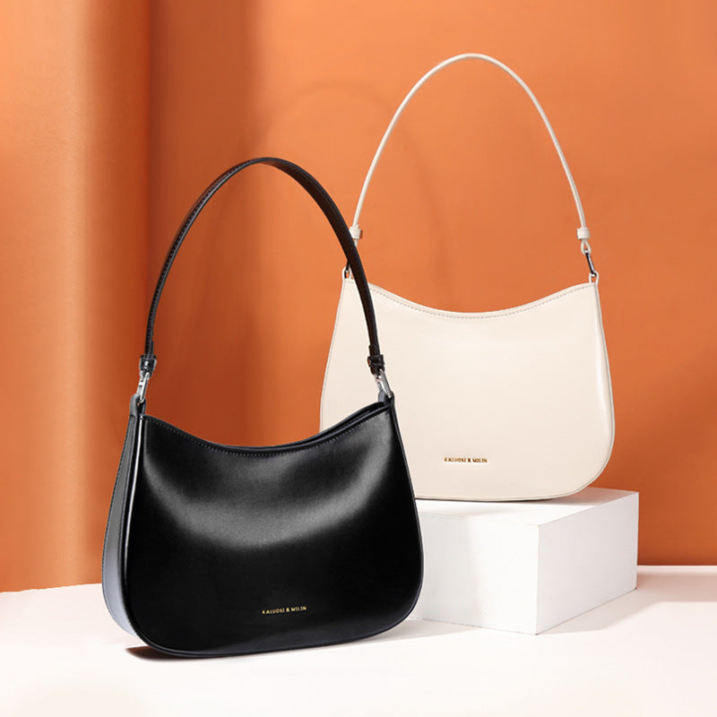 Elegant black and cream shoulder bags from Special Interest Design Bag for fashion and ملابس enthusiasts