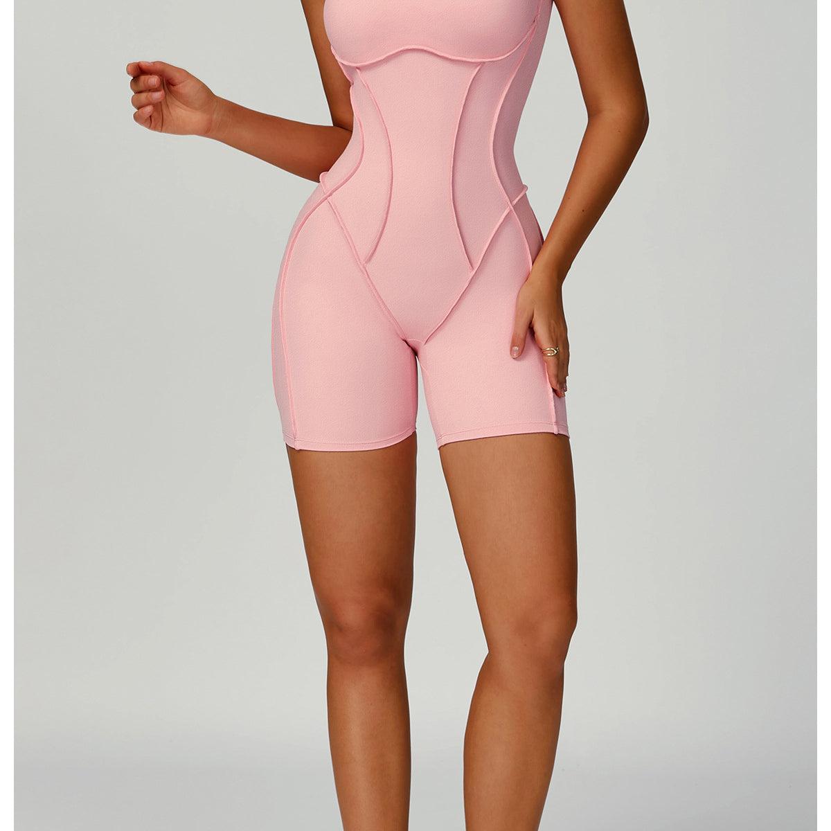 Pink Langry Yoga Jumpsuit in form-fitting bodysuit with white accents