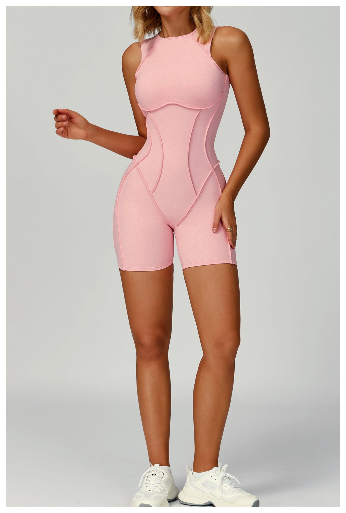 Pink Langry Yoga Jumpsuit in form-fitting bodysuit with white accents