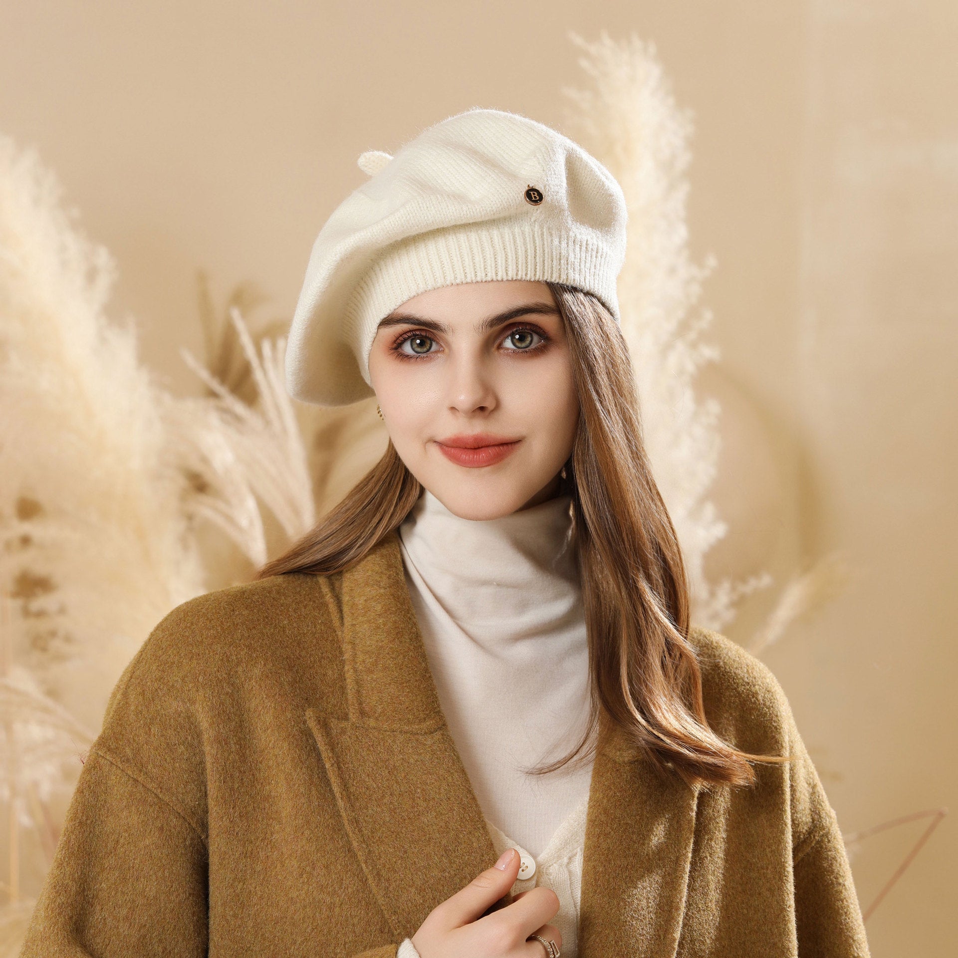 Woman wearing a cream-colored beret from Knitted Korean Small Painter Cloud Hat, stylish ملابس