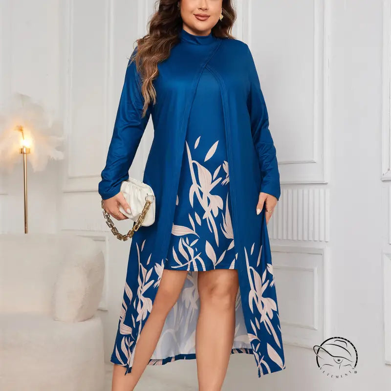 Plus-size woman in faux two piece long sleeve dress with blue abstract leaf pattern