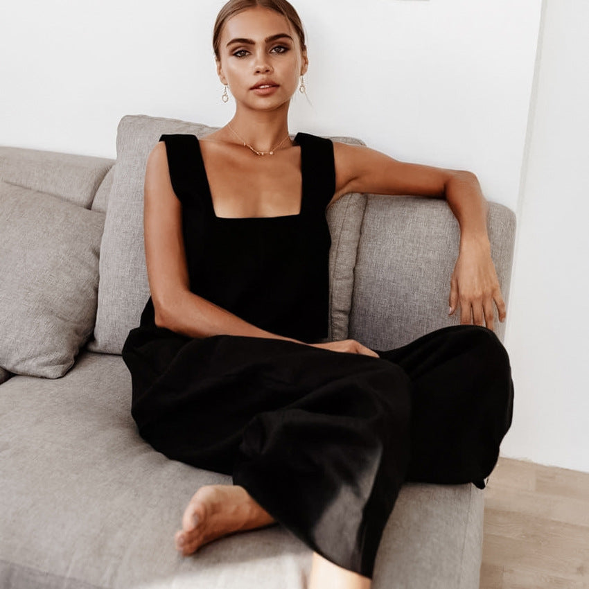 Elegant woman in black jumpsuit showcasing Fashionable Cotton Linen Homewear Suit for stylish ملابس