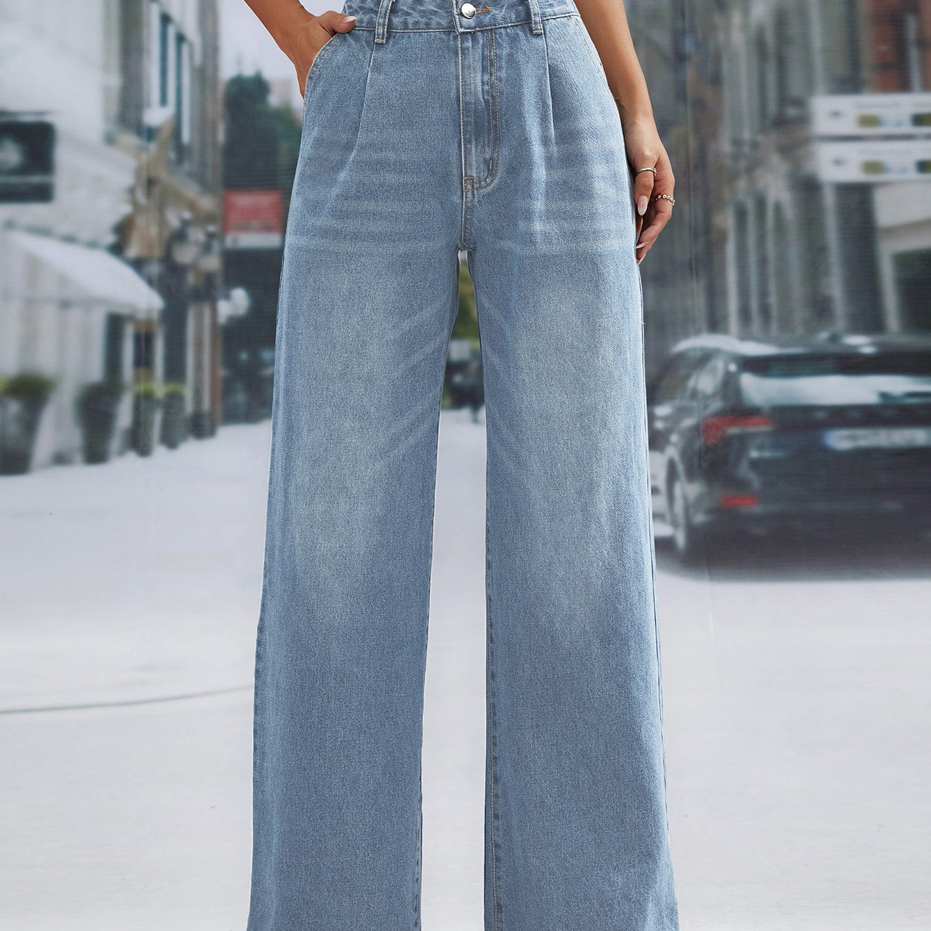 Light wash denim trousers with wide leg and high waist, stylish and flattering fit