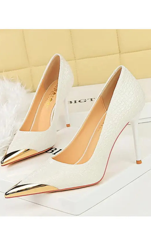 Elegant white leather high-heeled pumps with gold toe caps in Langry fashion