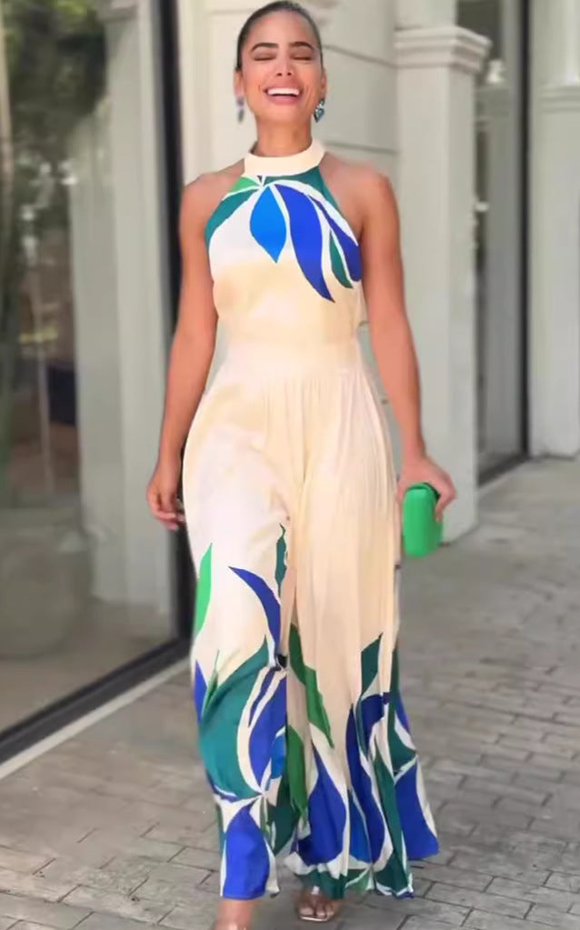 Cream-colored summer printed flared shorts jumpsuit with blue and green leaf print