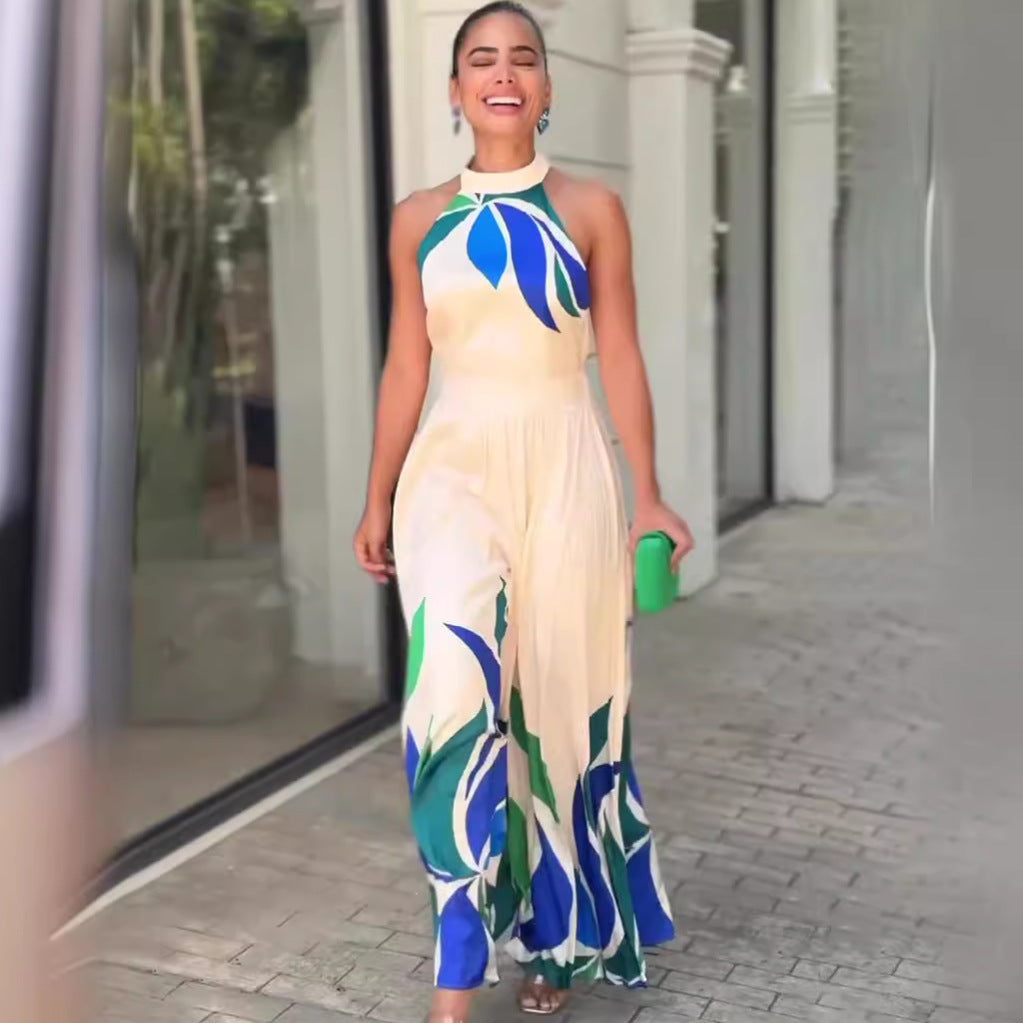 Cream-colored summer printed flared shorts jumpsuit with blue and green leaf print