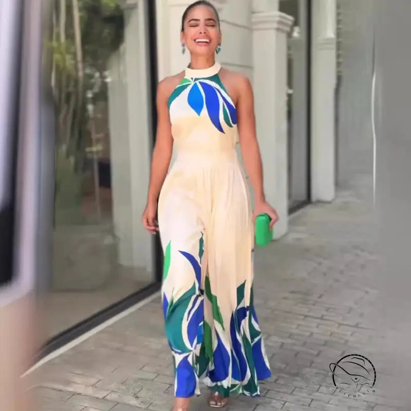 Summer printed cream halter jumpsuit with leaf print and flared shorts