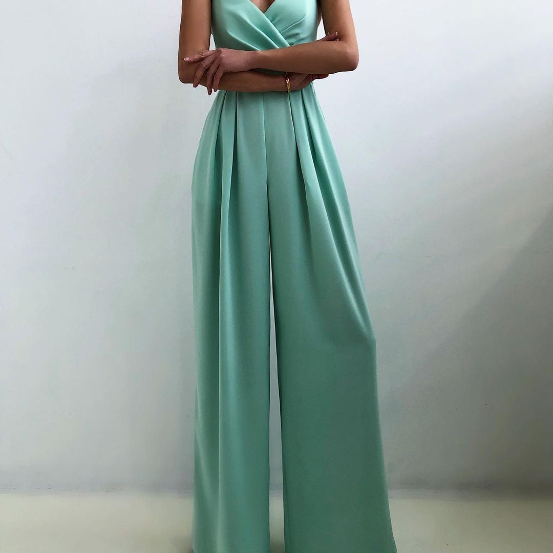 Mint green strapless jumpsuit with pleated wide-leg pants for modern fashion ملابس