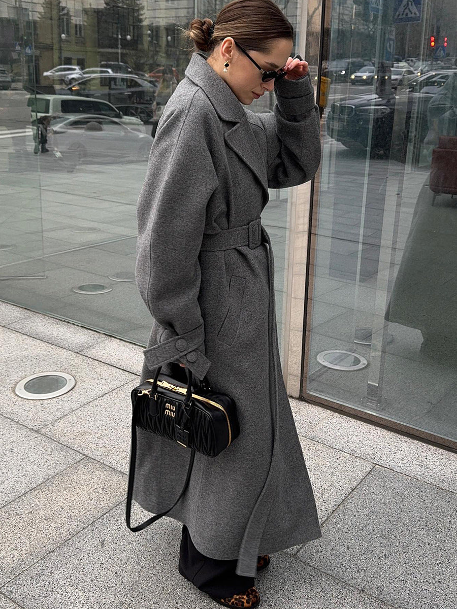 Black Quilted Miu Miu Handbag with Gold-Tone Hardware in Langry Fashion Coat