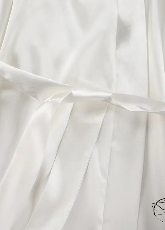 Elegant langry fashion flowing white satin robe with belt for ice silk pajamas
