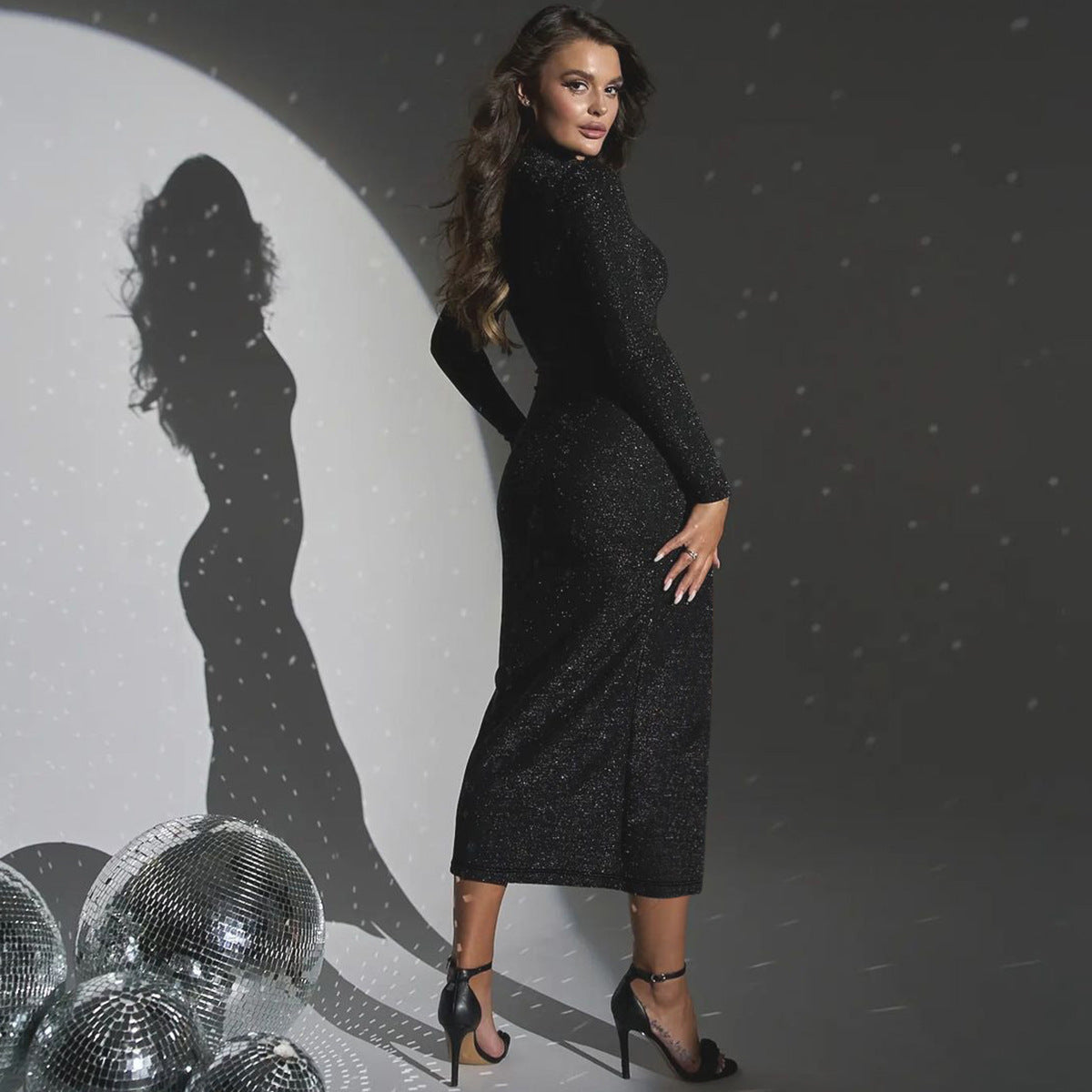 Sparkly black midi dress from Stars Slim Fit Slit Dress collection showcasing elegant fashion and ملابس