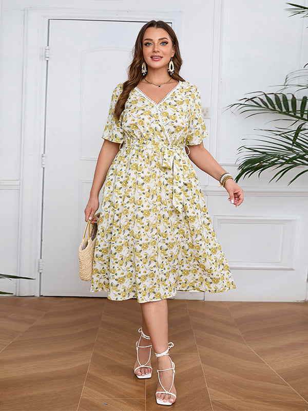 Plus-size boho lace floral V-neck midi dress with tie waist showcasing elegant style