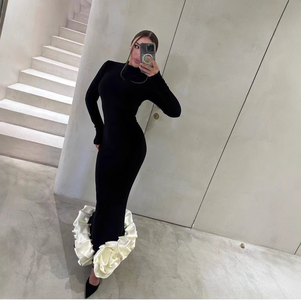 Black long-sleeved fishtail floral dress with ruffled hem for elegant fashion and ملابس style