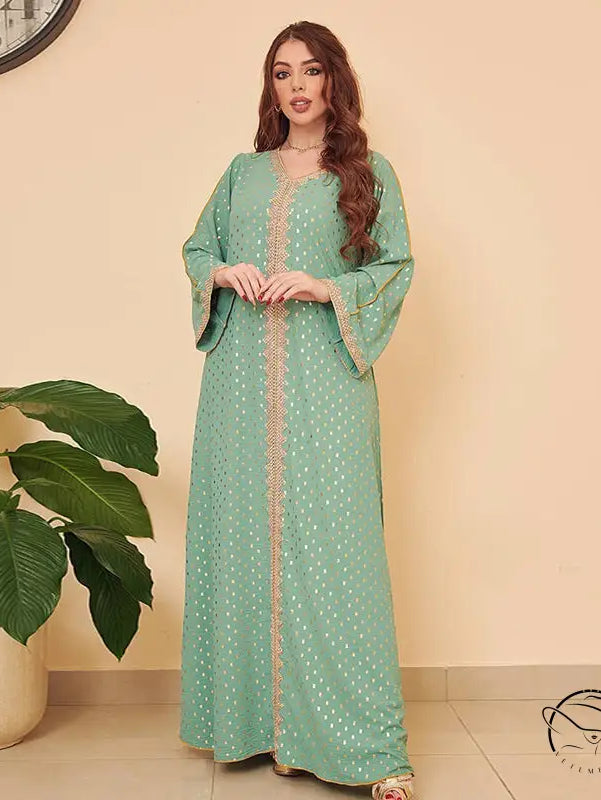 Mint green embroidered kaftan dress with bell sleeves and gold trim in gorgeous Middle East fashion style