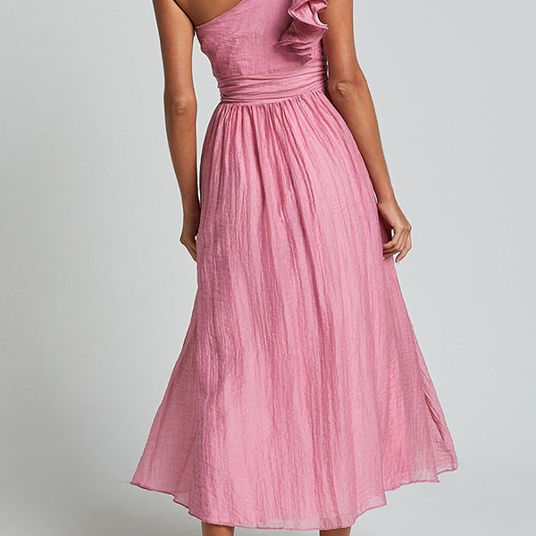 Pink one-shoulder midi dress with ruffles and flowing skirt in fashion collection
