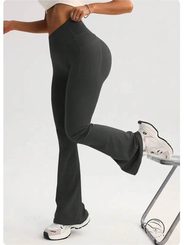 Dark gray high-waisted flared langry yoga pants in stretchy fabric
