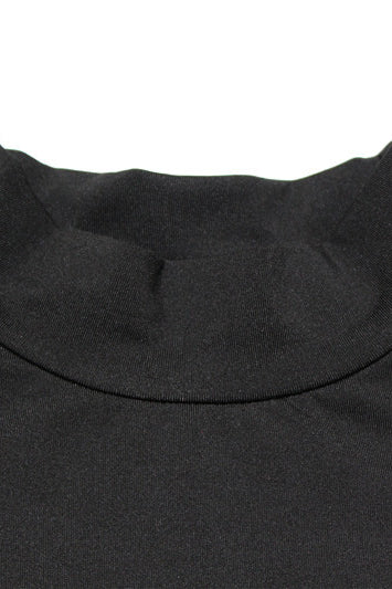 Close-up of solid color hollow cutout cropped tight jumpsuit with black mock neck top