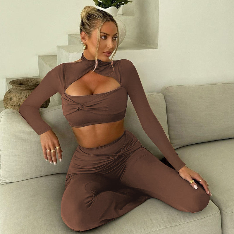Woman in brown long sleeve halter pleated slim fit flared pants fashion sports set