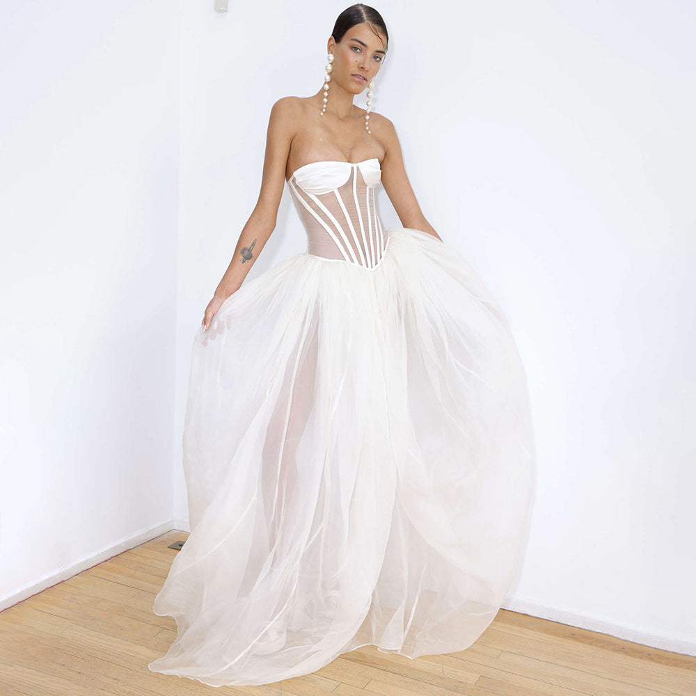 Strapless white wedding gown with corset bodice and tulle skirt for elegant fashion ملابس