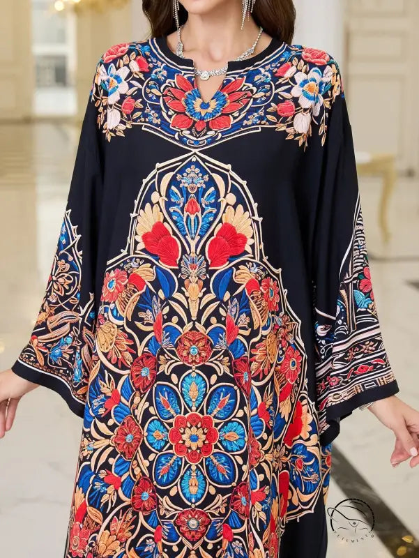 Elegant loose black floral print tunic dress with three-quarter sleeve length